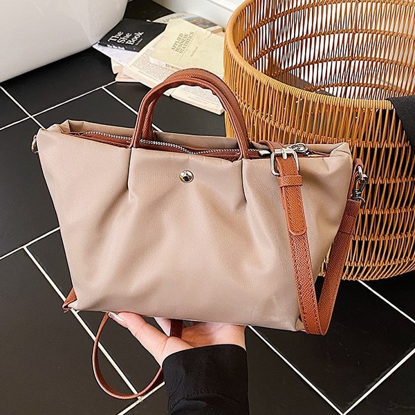 Borsa a tracolla casual da donna in tessuto Oxford, capiente, elegante e versatile, ideale per gli spostamenti quotidiani._voghion.com
