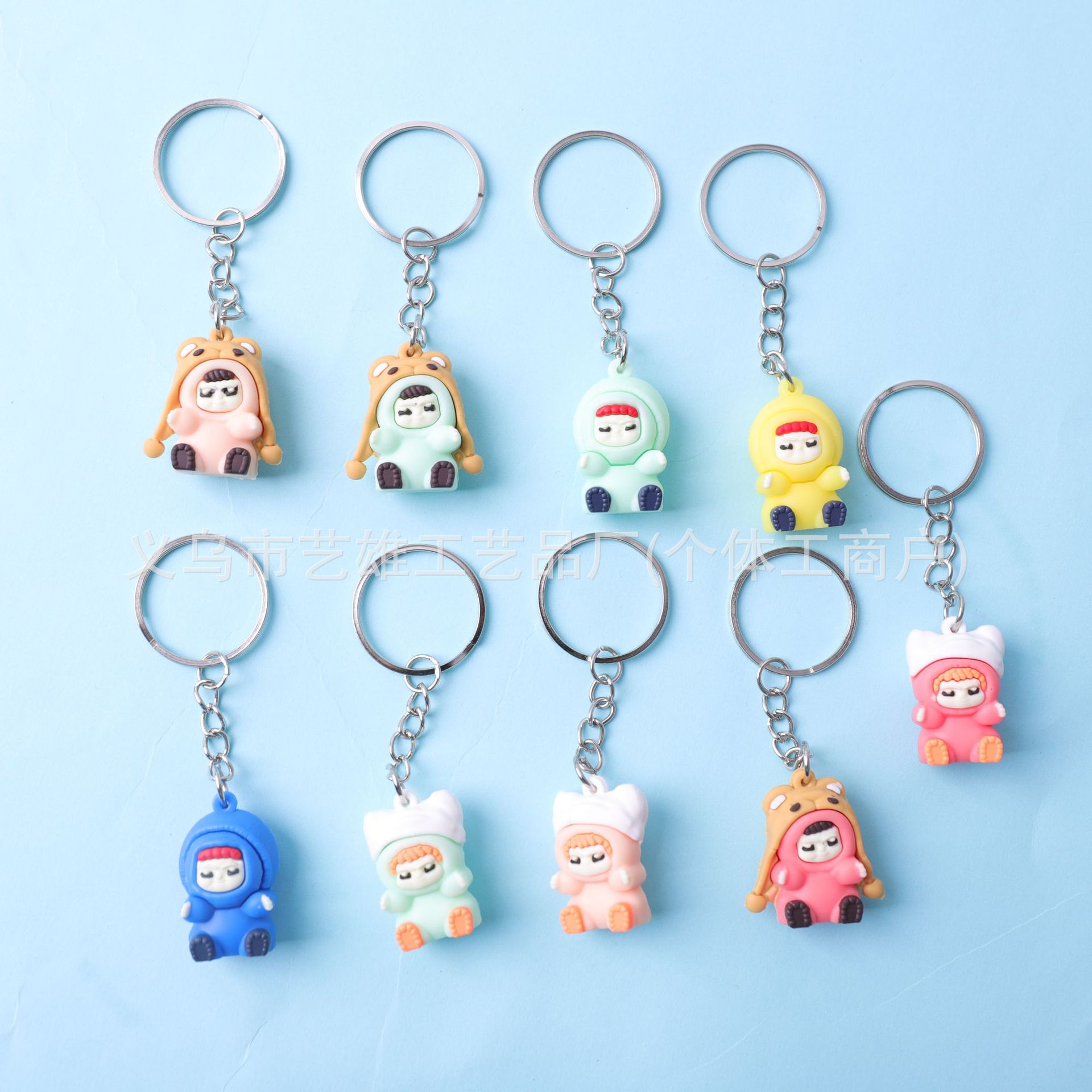 Nuevo estilo de dibujos animados de PVC huevo llavero de fiesta muñeca pequeña decoración creativa pegamento suave adorable colgante al por mayor