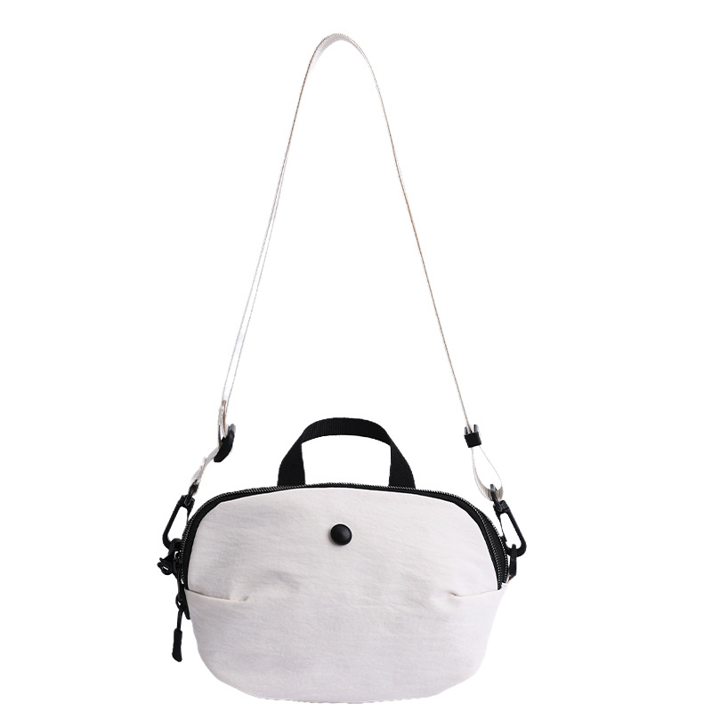 Bolsos pequeños de moda coreana 2025 verano nuevo estilo bolso femenino bolso de lona simple bolso de hombro casual bolso de mensajero con correa de hombro ancha