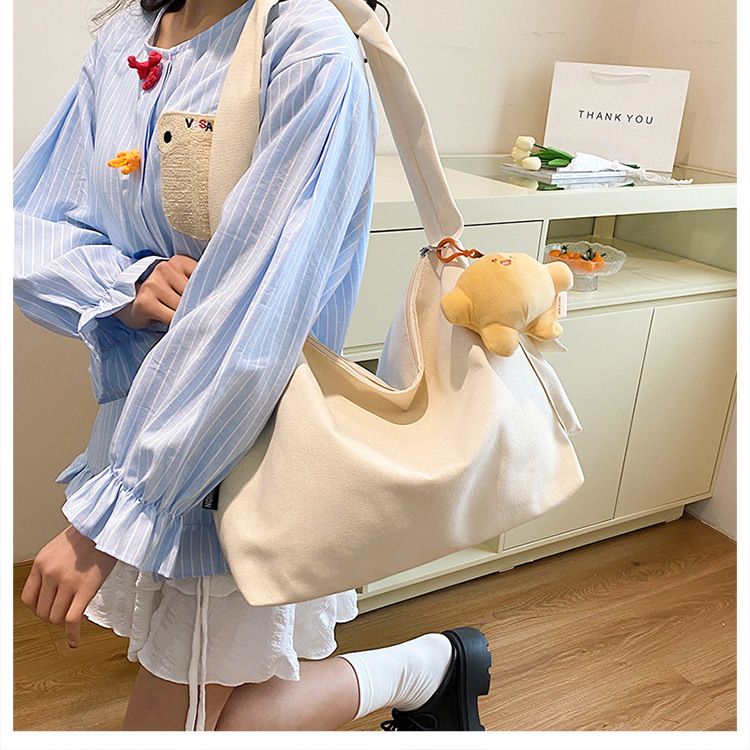 The 2024 new Korean-style simple and laid-back casual canvas crossbody bag and the large-capacity versatile tote bag are selling well undefined