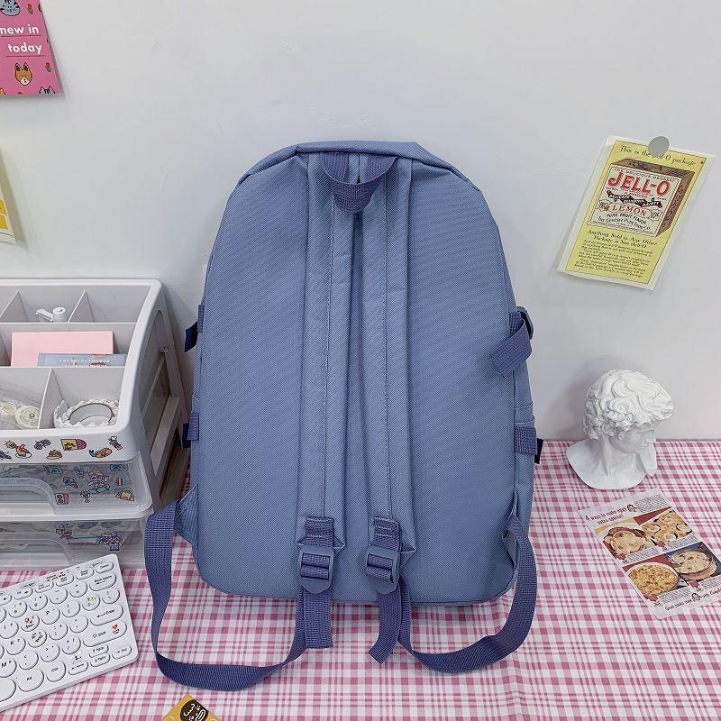 New Korean version with stylish large capacity Oxford cloth multi-purpose four piece backpack for primary, secondary,_voghion.com