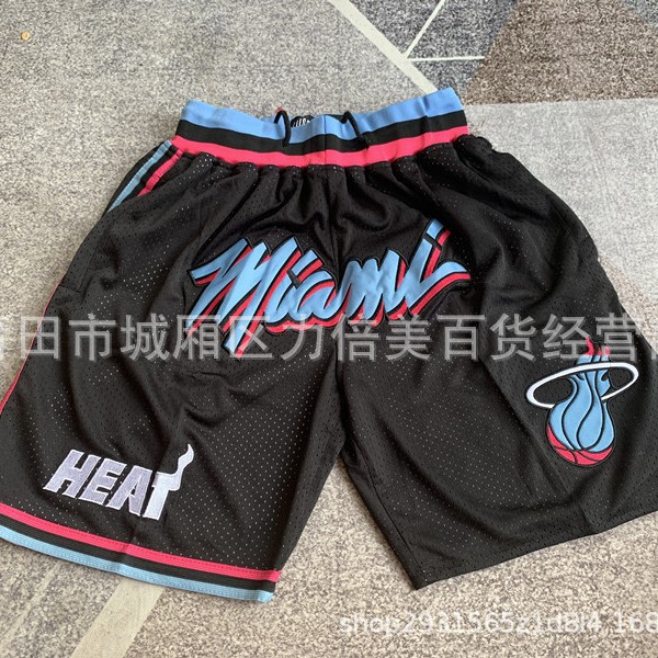 Comercio exterior pantalones de fútbol al por mayor Warriors Lakers 76 caliente Raptor mágico bolsillo bordado pantalones cortos pantalones de baloncesto NFL