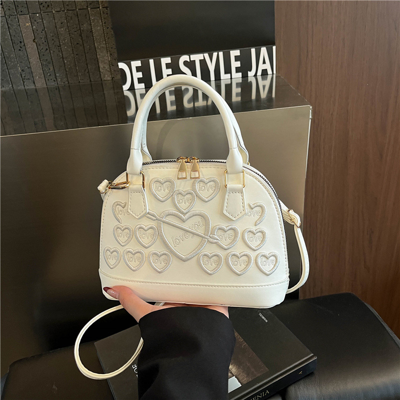 industria pesada bordada amor bolsos de mujer bolsos transfronterizos2026 nueva mujer hombro bolsos de mano