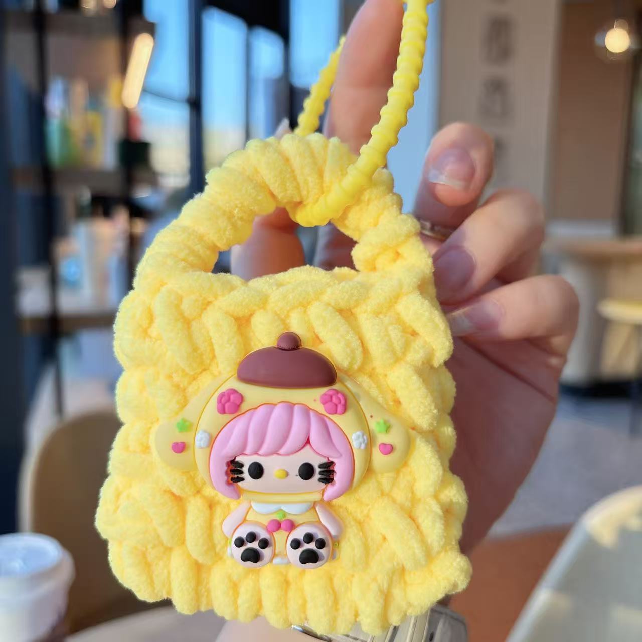 Creativo dibujos animados Kullomi lana trenzado bolsas de cambio llaveros auriculares portátiles lindos trenzados bolsa de almacenamiento regalo