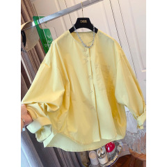 韓国系の純色の長袖のシャツの女性の春の新型のゆったりしている単列のボタンのファッションの気質は年齢を減らして丸首のシャツを重ねます。