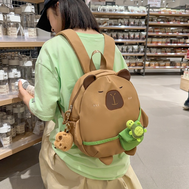 Mochila japonesa encantadora de dibujos animados 2024 nueva extraña mochila de muñeca de gran capacidad de muñeca de estudiantes