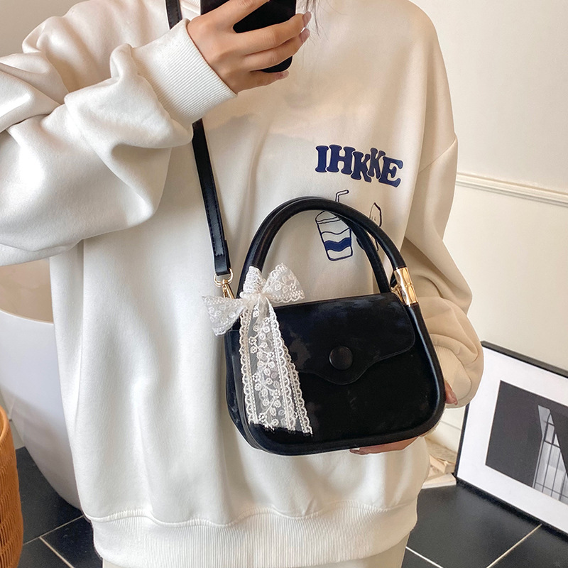 Bolso cuadrado pequeño de mano de estilo occidental de moda para mujer 2025 nuevo bolso de hombro casual de todo fósforo bolso de mensajero de alta calidad transfronterizo