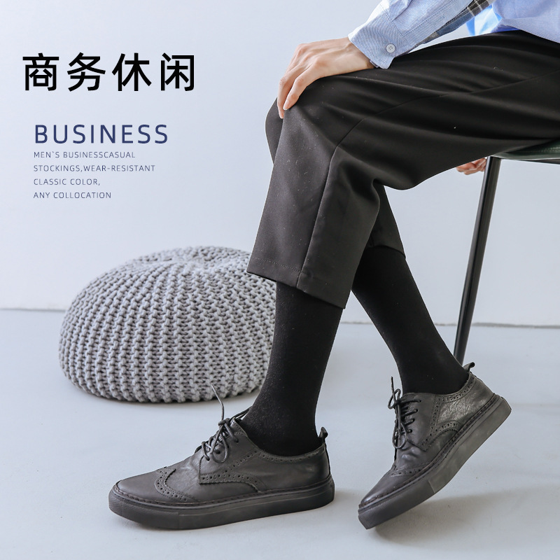 Calcetines largos para hombre, calcetines altos informales de color sólido para otoño e invierno, calcetines largos de algodón negros, calcetines transpirables que absorben el sudor