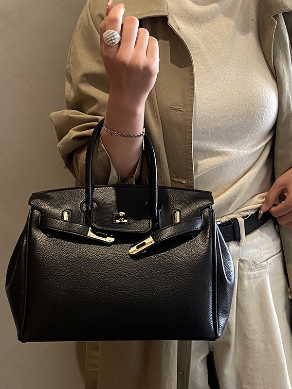 Bolsos de platino retro retro de alta calidad para mujeres 2026 comercio exterior nueva moda litchi pattern commuter mochila versátil