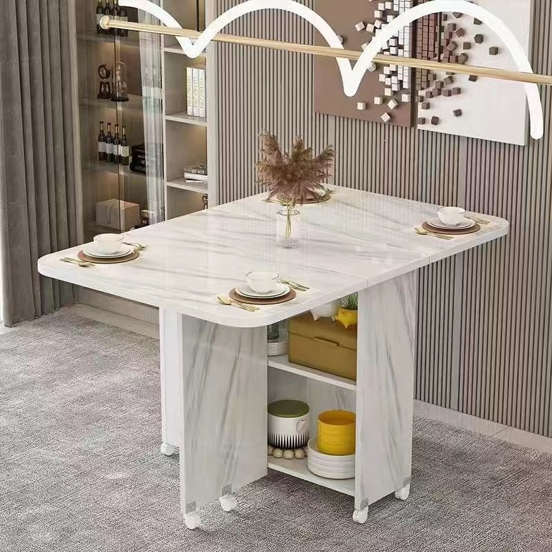 Mesa de comedor redonda simple y plegable tipo pequeño hogar con ruedas móviles simple y rectangular mesa de comedor multifuncional