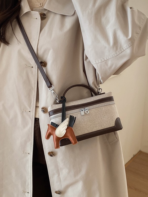 Bolso de mano de alta sensación 2026 nuevo lienzo de moda bolso de color pequeño bolso cuadrado de viaje bolsa de mochila ocio