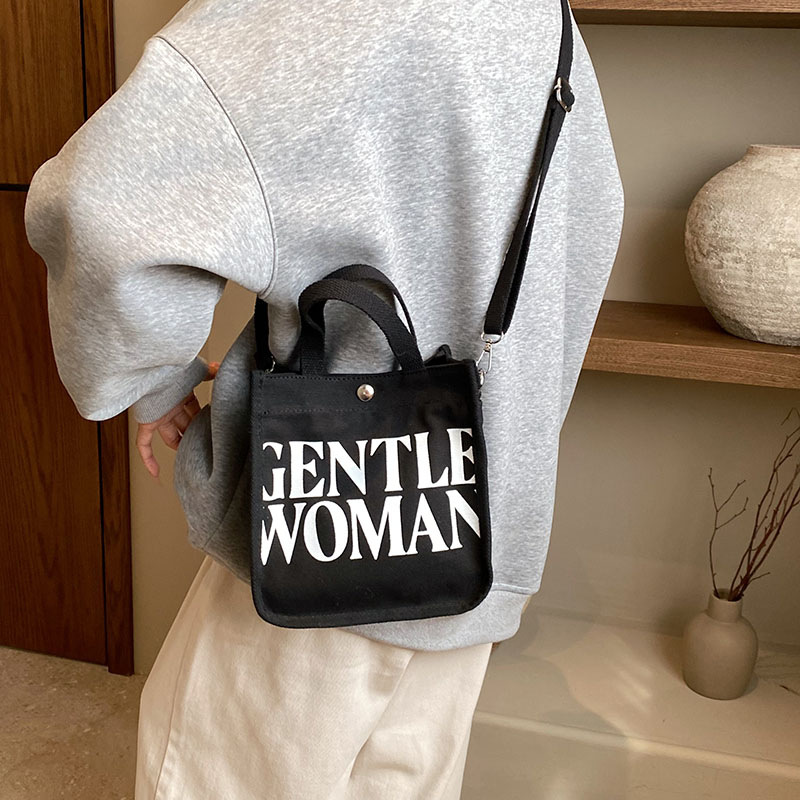 Moda rayas bolsa de lona para mujeres 2023 nueva carta impresión portátil bolsa de compras bolso de hombro al por mayor