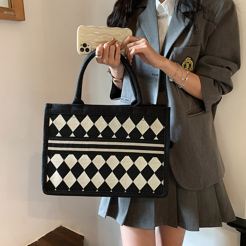 Blanco y Negro tablero de gran capacidad bolso de mano portátil 2023 nueva moda simple trabajo bolso de hombro