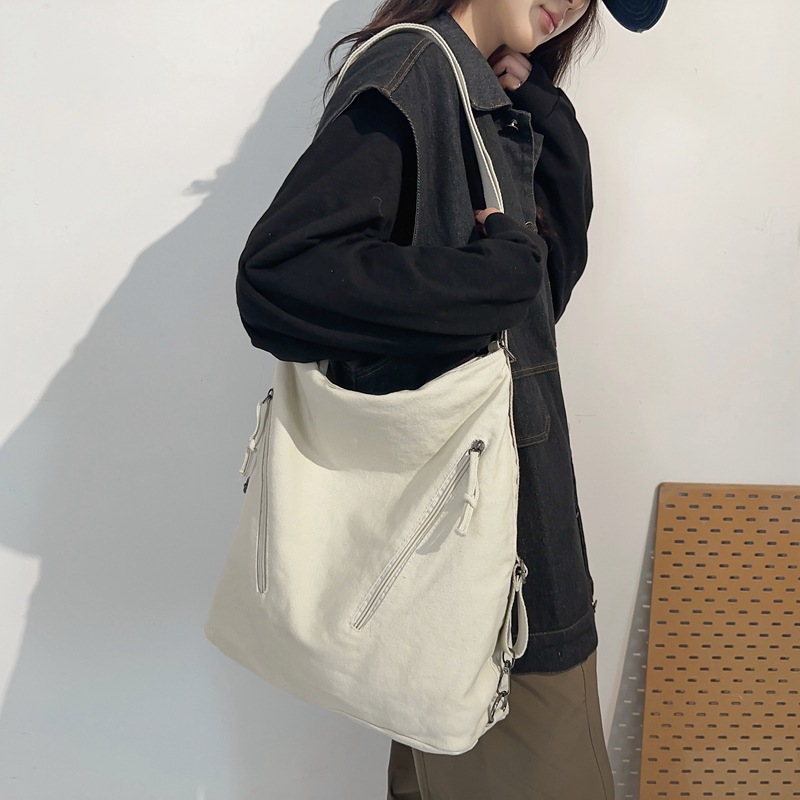 Bolso de lona para mujer 2024 nuevo bolso de mensajero de un solo hombro de gran capacidad mochila de viaje para estudiantes multifuncional al por mayor