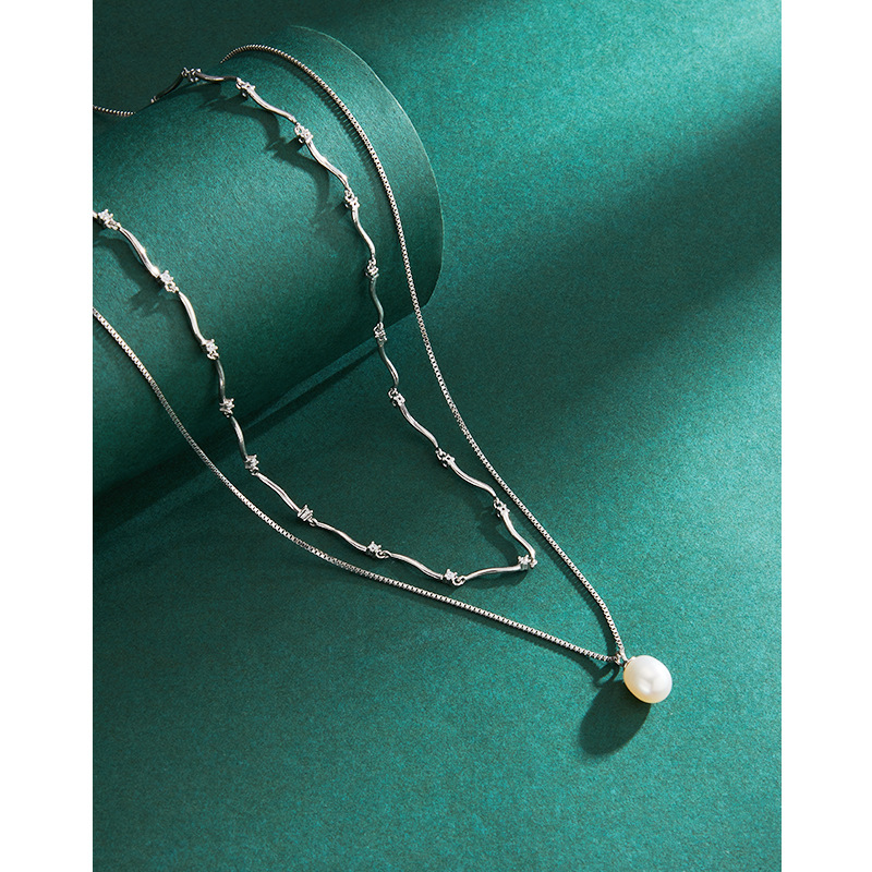 Collar apilado de perlas de agua dulce para mujeres 925 Luz de plata de ley nicho de lujo elegante de alto grado de doble capa accesorios de cadena de clavícula