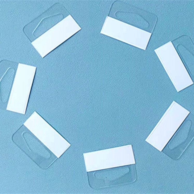 Gancho de protección del medio ambiente PET transparente fuerte adhesivo triángulo agujero gancho embalaje caja de color PP gancho autoadhesivo tarjeta de visualización gancho