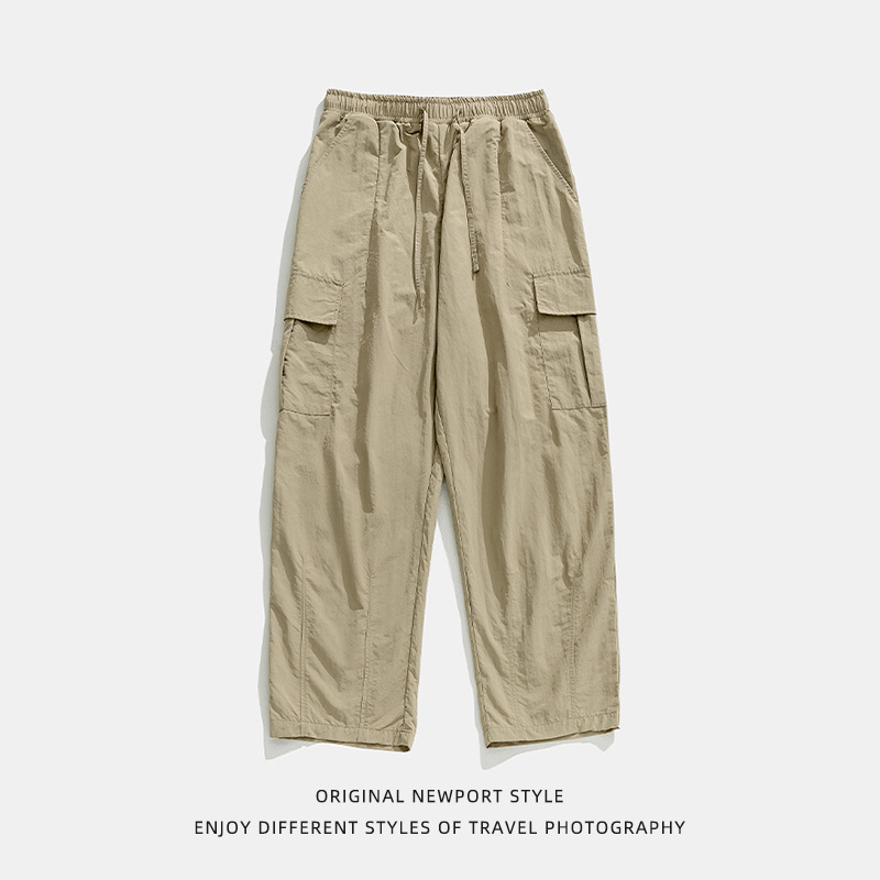 Mono de bolsillo tridimensional para hombre primavera nuevo estilo montaña ligero y suelto diseño plisado pantalones largos casuales para hombre