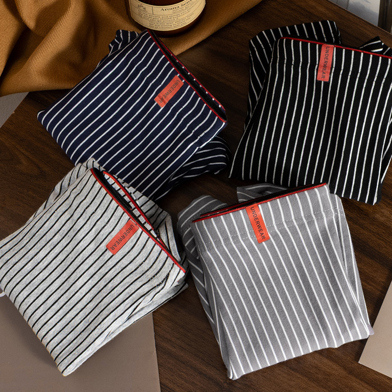 Pantalones de hombre rayadas algodón Xinjiang algodón piel transpirable sueltas grandes al por mayor pantalones de hombre cintura media cómodas