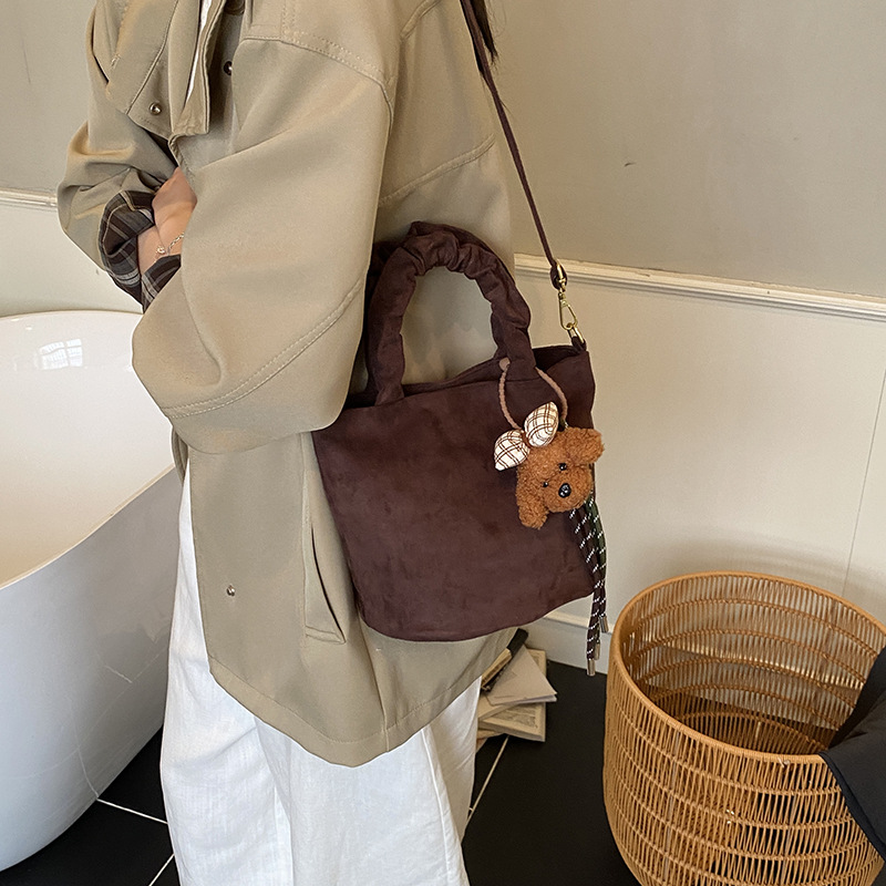 Moda leopardo bolso de niña lindo perro colgante mochila de niño otoño y invierno nuevo bolso de niños de peluche