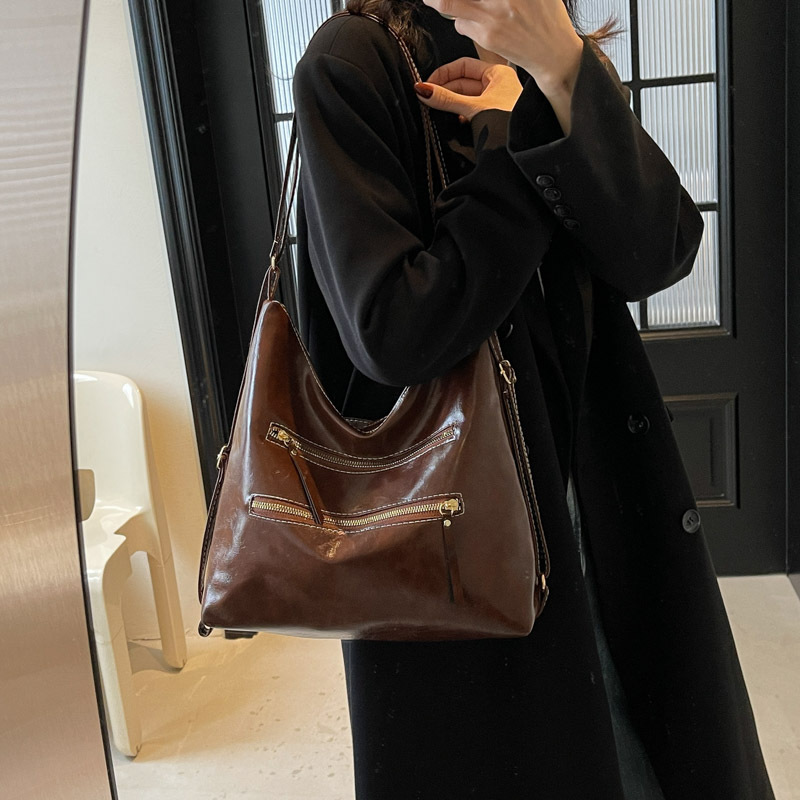 Casual viaje retro bolsos de mujer 2025 nuevo otoño invierno de alta capacidad sensación de hombro mochila bolsa