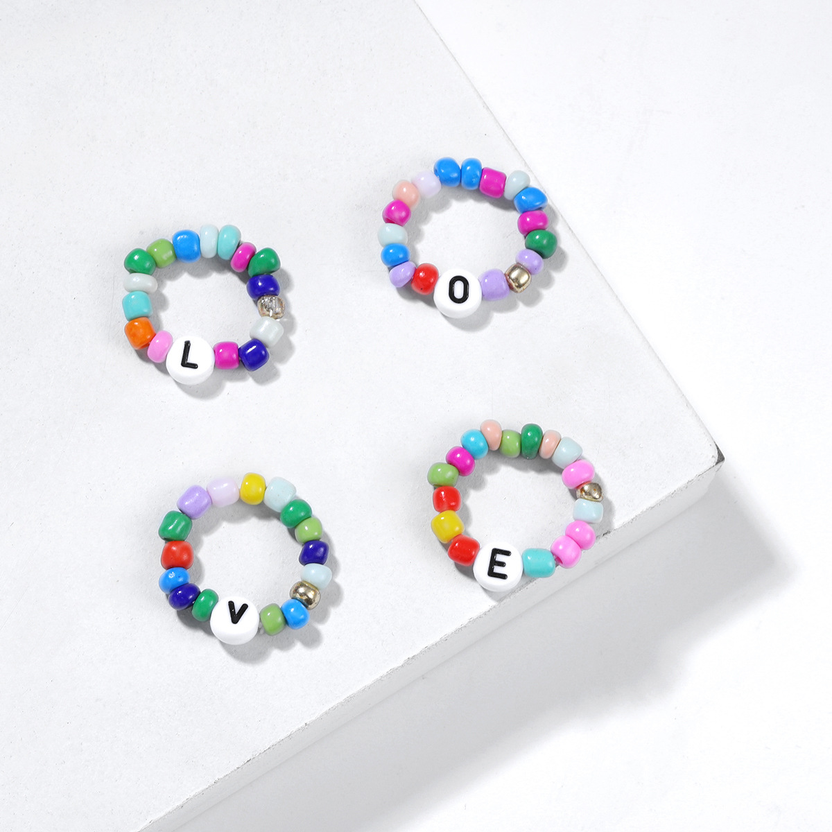 Fashion Letter Ring Elastic Beads Ring Love Ring Four-piece Wholesale display picture 3