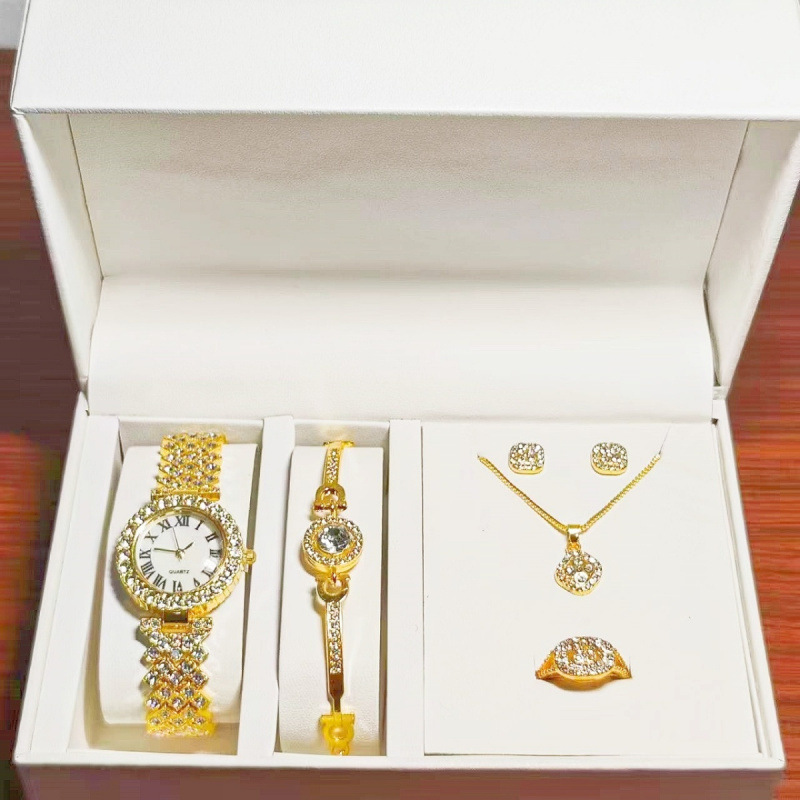 Золотые римские часы + комплект из четырех предметов «Дыхание ребенка» (колье, кольцо, серьги и браслет)