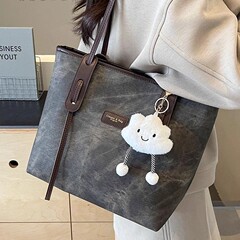 金玉鳥大容量バッグ女性2025新高級感デニムシングルバッグ通勤バッグ
