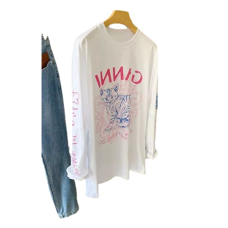 綿の高級感の猫のアルファベットの落書きのプリントの白い長袖のtシャツの女性の早秋のゆったりしていることが見えます。|undefined