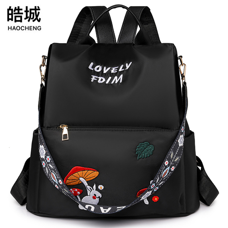 Mochila antirrobo para mujer 2025 primavera nueva moda de nailon salvaje mochila para mujer mochila de viaje de doble uso