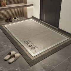 家に入ると、ドアのマットの高級感があります。
