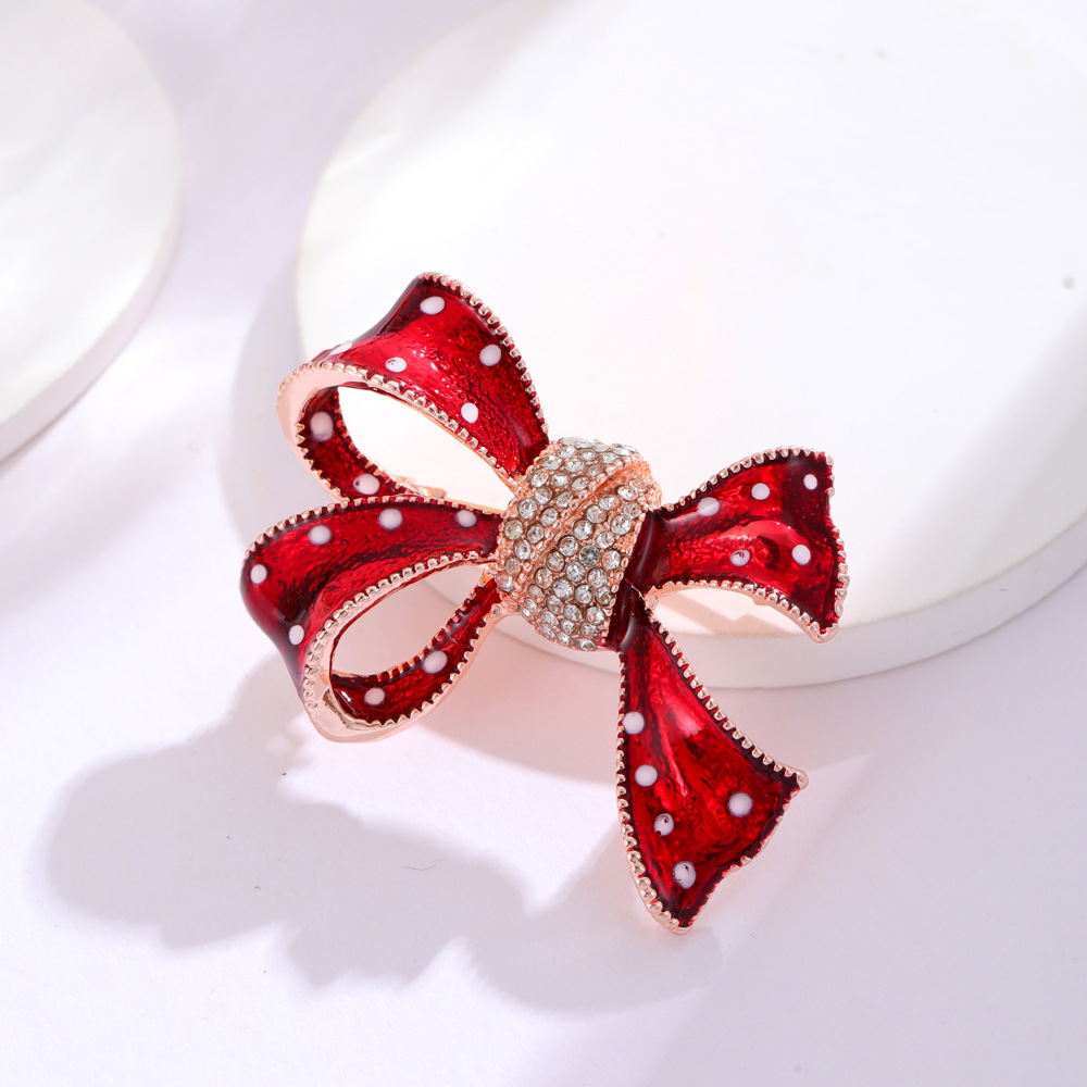 Simple Style Bow Knot Alloy Enamel Plating Inlay Rhinestones Unisex Brooches display picture 5