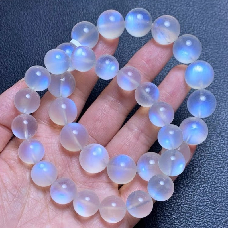 天然氷種クリーム体の青い月の光のブレスレットの女性の虹の光の月の光の強い青い水晶の手は女性を送ります。|undefined