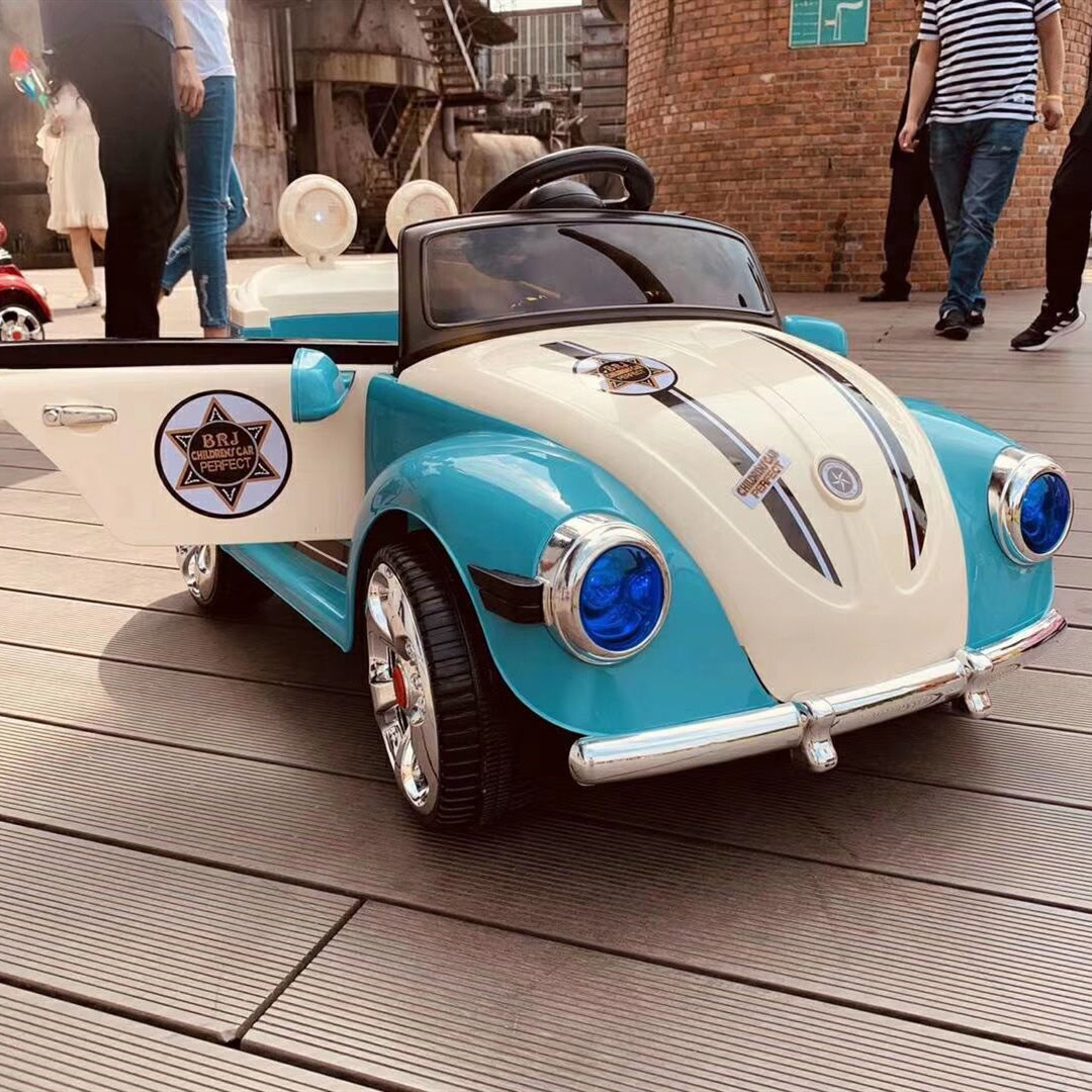 Nuevo coche eléctrico para niños Lindo coche de princesa de cuatro ruedas de control remoto coche eléctrico portátil cochecito de juguete para niños