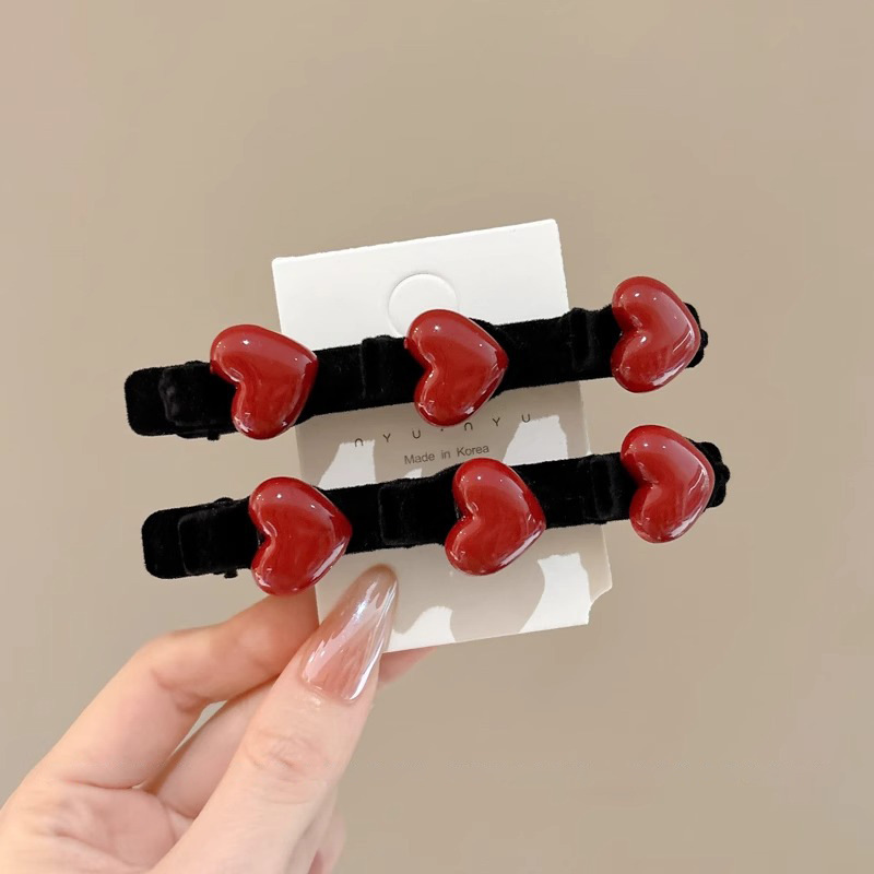 15 ¿ un par de horquillas de amor