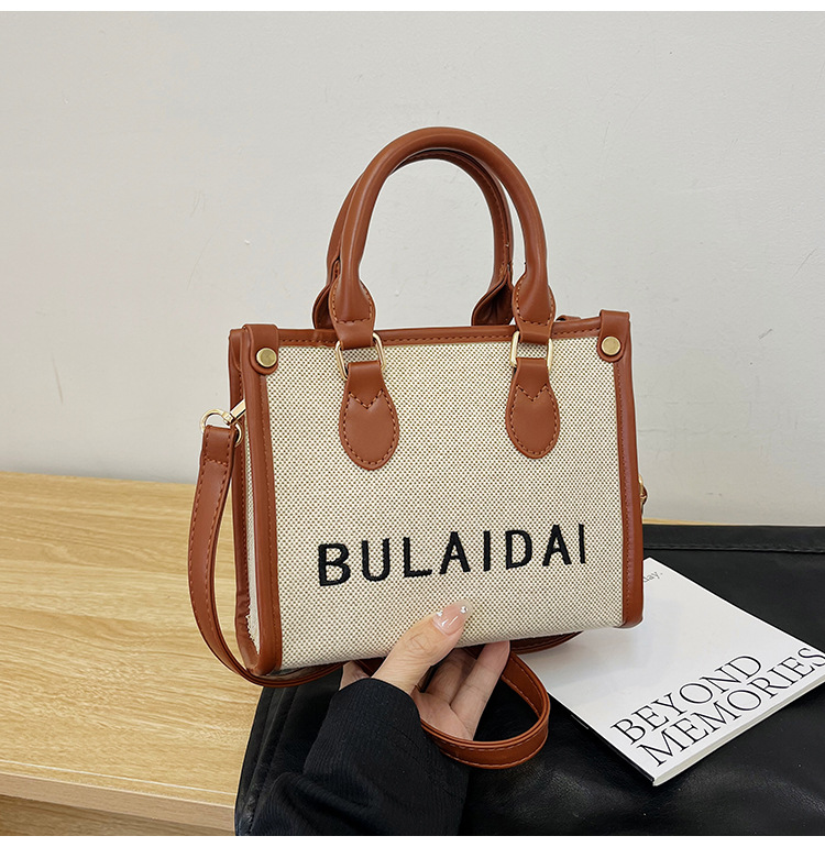 Bolsos para mujer 2026, nuevo estilo de moda, bolso tote de lona con logo bordado, bolso de mano de alta gama, bolso bandolera para el día a día