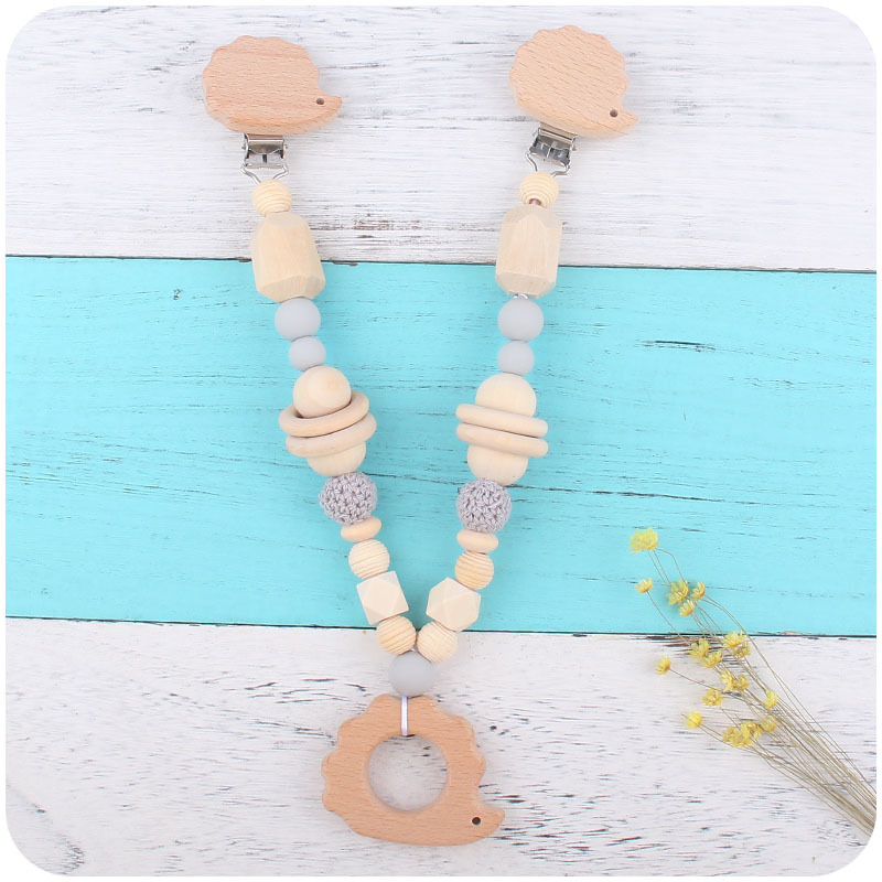 Suministros para bebés Hemu pulsera molar juguete para niños erizo cochecito Cadena de tres piezas creativa pezón cadena colgante