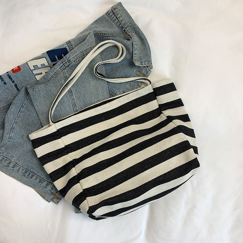 Corea del Sur ins bolsas de lona a rayas de color contraste bolsas de hombro de gran capacidad bolsas de compras de viento perezoso bolsas grandes