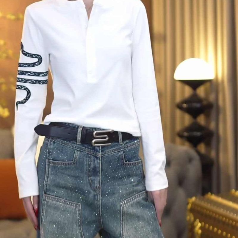 大码蛇年设计感排扣长袖t恤女春季2025新款宽松显瘦遮肉外穿上衣|undefined