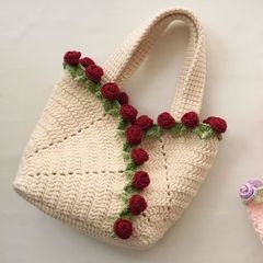 バラの花のバッグの手編み専用の糸の材料は完成品の花束を包みます。