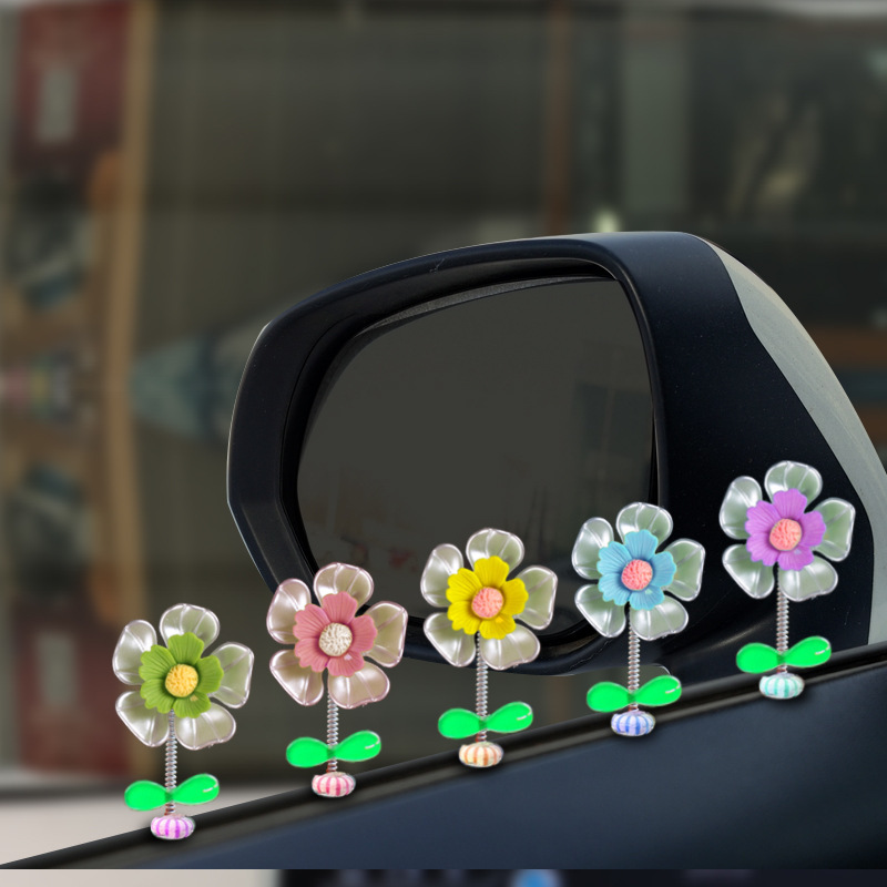 Decoraciones de automóviles 2023 nueva consola central de flores de conchas frescas sacude la cabeza adorable decoración de flores pequeñas