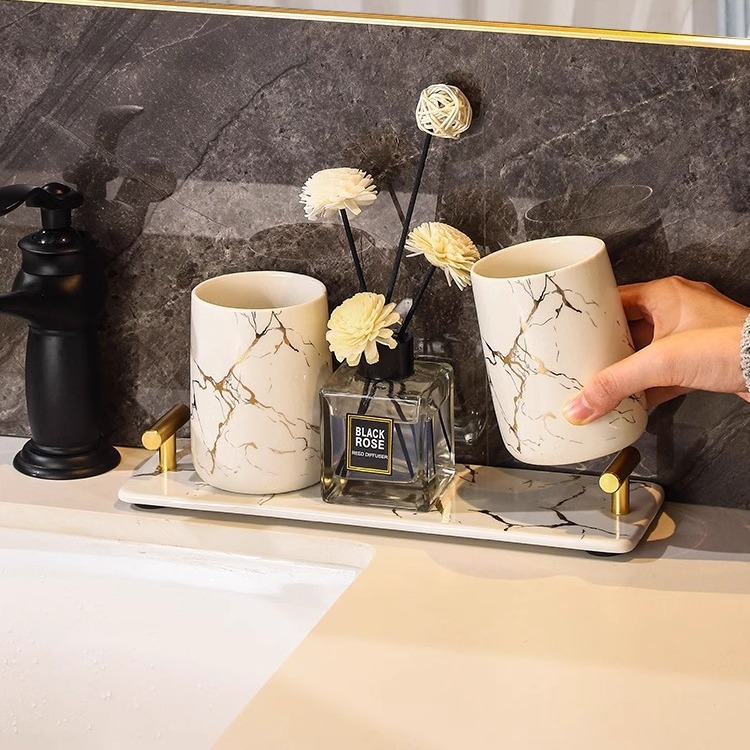 Baños del hotel con oro pintado set de lavado de comercio exterior creativo de mármol botella de emulsión enjuague bucal accesorios de baño