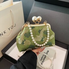 国境を越えて起爆した大花新中国風バッグとシングル肩の斜め掛けの手提げ口ファッション女性ディナーバッグ