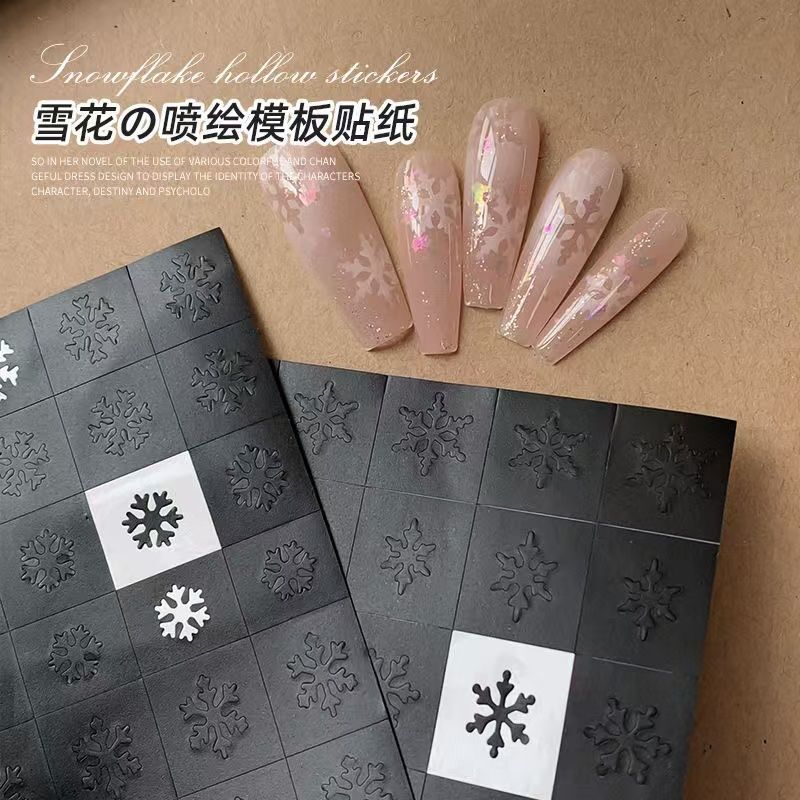 Nail art jewelry snowflake hollow spray painting template sticker Christmas new French blooming spray painting super fairy nail decal