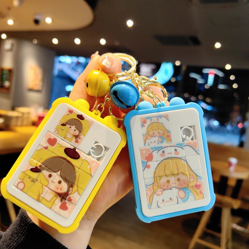 Cartoon Sanrio jigsaw puzzle game keychain decompression small gift schoolbag bag pendant children's educational toys wholesale