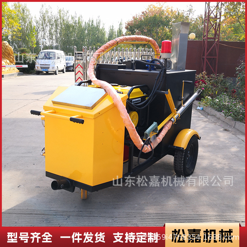Máquina de llenado de pavimento de asfalto empujada a mano pequeña máquina de reparación de grietas de carreteras de cemento máquina de llenado de curado de carreteras