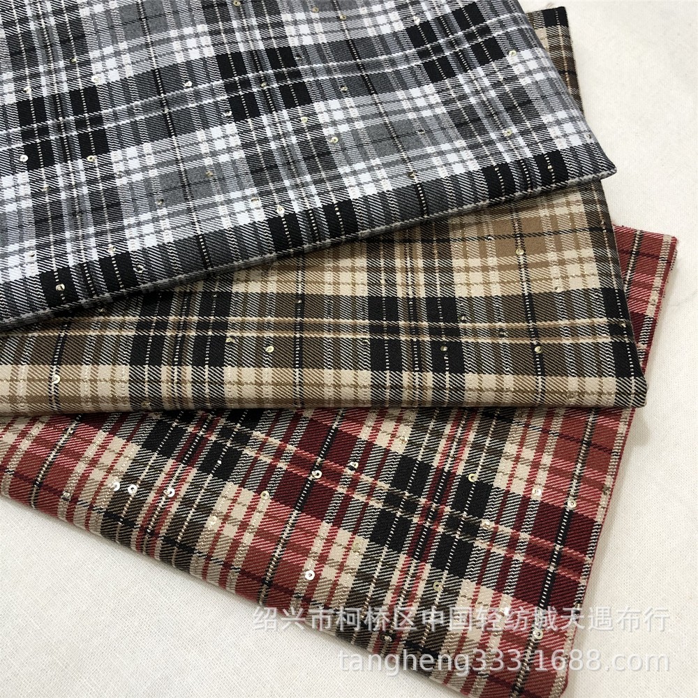 新款亮片工艺色织面料 TR涤纶弹力色织布 西装外套短裙装饰布现货