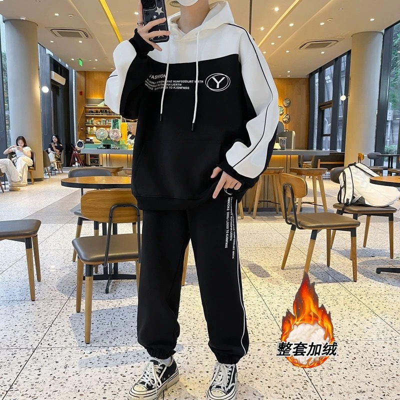 Otoño y invierno de hombre suelto encapuchado juego deportivo casual juvenil hombre con camiseta gruesa de dos piezas
