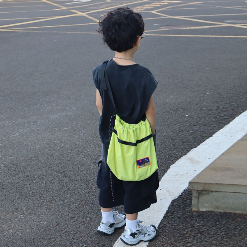 Bolso de hombro para bebé coreano de gran capacidad Bolso de mensajero para niños con cordón de aire extranjero Bolso para niños de viajes deportivos de ocio