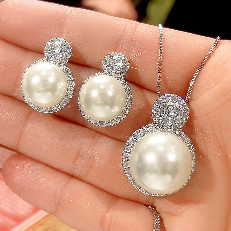 Colar com pingente elegante de pérola e pedra preciosa dourado_voghion.com