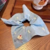 Blue scarf with bow